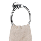 De Elarbo Chromen handdoekring van yessential.nl, gemonteerd op je muur, houdt op elegante wijze een beige handdoek met textuur - een stijlvol badkamer accessoire voor ruimtebesparende organisatie.