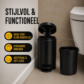 Zwarte prullenbak met uitneembare binnenbak in een toilet